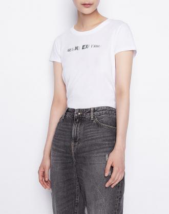 Γυναικεία μπλούζα T-shirt με κανονική εφαρμογή, κοντομάνικη, μονόχρωμη, με στρογγυλή λαιμόκοψη και τύπωμα λογότυπου μπροστά. ( Σύνθεση: 100% Βαμβάκι )