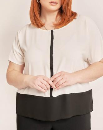 Γυναικεία μπλούζα με κοντό μανίκι, μονόχρωμη με λεπτομέρεια μονοχρωμία στο τελείωμα και στρογγυλή λαιμόκοψη. (Σύνθεση:100% Πολυεστέρας)
